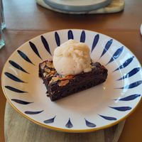 Chocolate Brownie with Ice Cream at Rooted in Bath