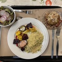 Couscous, roasted vegetables, salad, and baked apple.  at A Praça in Sintra