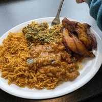 Veggie Platter with Jollof Rice, Eggplant Stew, Spinach with Pumpkin Seeds and Plantains at Mary's African Cuisine in Halifax