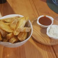 Potato wedges with sauces at A Porta Verde in Santiago De Compostela
