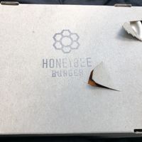 Take him box  at Honeybee Burger in Los Angeles