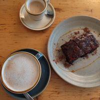 Brownie with chai latte and coffee at Mōpa in Paris