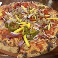Vegan ‘jerk’ pizza at The Tap Room in St John