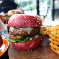 Delicious vegan cheese burger! Has pickles and relish to dieee for! Waffle fries are also the best!  at Lisica Cafe in Maribyrnong