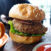 Vegan chicken burger with a mock chicken pattie at Lisica Cafe in Maribyrnong