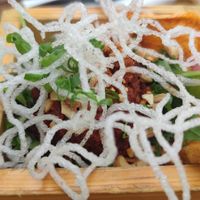 Basket with toppings for ramen at Uki Green in Warsaw