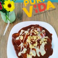 Enchiladas de mole!!! Queso de garbanzo y crema de almendras!! at Pura vida in Tuxtla Gutierrez