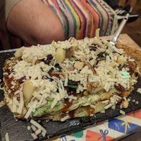 HUGGGE okinomiyaki with vegan cheese at OKO Okonomiyaki in Osaka