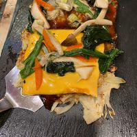 Okonomiyaki with cheddar cheese at OKO Okonomiyaki in Osaka