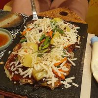 Okonomiyaki (vegan, with vegan may and cheese( at OKO Okonomiyaki in Osaka