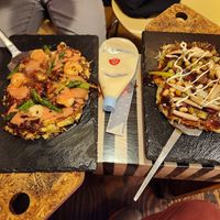 Vegan okonomiyaki on the right at OKO Okonomiyaki in Osaka
