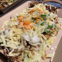 Okonomiyaki (with cheese but they have vegan cheese options)   at OKO Okonomiyaki in Osaka