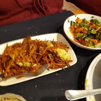 Fideuá y ensalada variada at CactusCat Bar in Barcelona