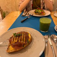 Cheese and ham toast, and an avocado toast at CactusCat Bar in Barcelona