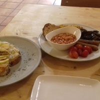 English breakfast, triple cheese crostini and smoothie of the day at CactusCat Bar in Barcelona