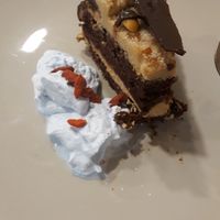 Tarta de chocolate con cacahuete y crema de coco. 😍 at CactusCat Bar in Barcelona