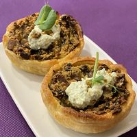 Mini quiche de champiñones  at CactusCat Bar in Barcelona