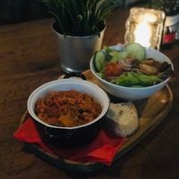 ‘Vegan lentil stoof, with bread and a small salad’ 
Had a nice dinner, the dish was tasteful.  at Café Forum in Maastricht