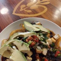 Chiliquiles with tofu subbed for eggs. Don't forget to say hold the  crema & cheese if you are vegan! at Love Muffin Cafe in Moab