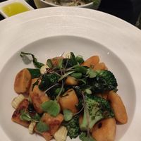 Sweet potato gnocchi. Green leaf salad (if you love vinegar go for it). at Glass Brasserie in Sydney