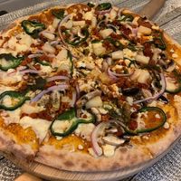 The Mexicana, but we also added pineapple and mushrooms. Amazing pizza!! Definitely recommend   at Jonny Como Pizza in Playa Del Carmen