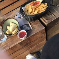 vegan chilli son carne pastries (left) and tacos with tomato salsa (not marked as vegan on the menu) at El Niño Beach Club in The Hague