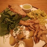 Heura, fusili with pesto, green coconut sauce, bread, salad and potatoes at Margarito in Bilbao
