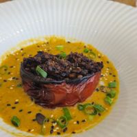 Poivron farci au boulgur, lentilles et champignons, crème de courgettes, coco, curry at La Cantine in Honfleur