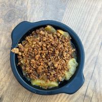 The vegan dessert. Tasted good, not incredible since I believe there was a vanilla sauce supposed to go with it and it probably was not vegan... So they said it would be there buuuut it wasn't 🥲 at La Cantine in Honfleur