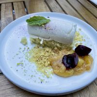 Vanilla panna cotta with lemon sponge cake, lemon crunch and fresh cherries… so light and delicious!!  at Frankie We Salute You! in Kelowna