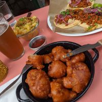 Taco chorizo, wings and mac&cheese. All vegan. at Vegan Junkies in Lisbon