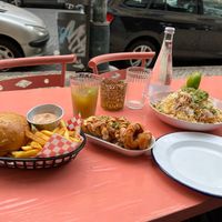 Burger w/fries, Onion rings and loaded nachos. at Vegan Junkies in Lisbon
