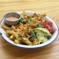 nacho plate (with fries because the nacho chips run out) at Vegan Junkies in Lisbon