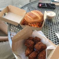 Buffalo tofu burger and chick’n nuggets  at MTHR Vegan in New York City