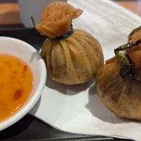 EDAMAME & COCONUT MONEYBAGS with sweet chilli sauce - $14.5 at Yulli's in Surry Hills