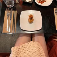 Spread with money bags and ginger dumps   at Yulli's in Surry Hills