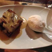 Sticky date pudding with coconut ice-cream. at Yulli's in Surry Hills