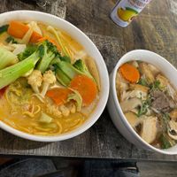 Veggie laksa & beef pho  at West End Vegan Restaurant in West End