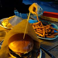 Mango burger, sweet fries and falafel dania. at Mango Vegan Street Food - Zelazna in Warsaw