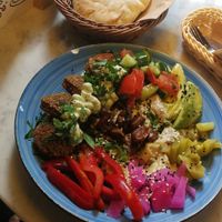 Talerz z trzema rodzajami hummusu i falafelami, pycha! at Mango Vegan Street Food - Zelazna in Warsaw