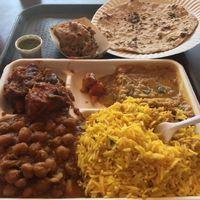 3 item combo (daal, channa masala, eggplant and potato) with lemon rice, chapati and pakora. So good and so cheap.  at India Sweets and Spices in Culver City