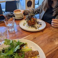 Corn fritters (background), Foreground (scramble tofu and polenta) at Little Lotus Cafe in Hobart