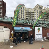 The v360 Plant based Cafe in Brighton between the basket ball pitch and the I360 on the beach level , opposite the Hilton and the Grand hotel. at v360 in Brighton