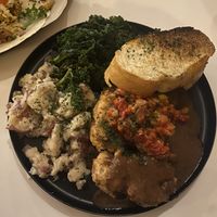Country Fried Caulisteak With Toast, Potatoes & Kale  at Vegan Food House in Dallas