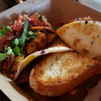 Sharing BLT and Blackened Shrimp street tacos at Vegan Food House in Dallas