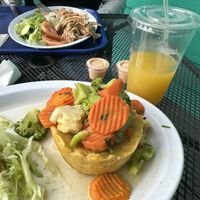 Vegan mofongo and passion fruit 🥤 juicee  at Mofongo Cafe in Nashville