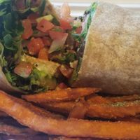 Loved the Twist Wrap with grilled chick'n & ranch. Sweet potato fries. at Native Foods in Palm Springs