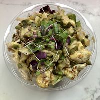 “The Major Stride” Salad. Organic greens, roasted cauliflower, beets, quinoa, pumpkin seeds, topped with organic micro greens and homemade  vinaigrette dressing.     at MIGHTY LOVE FOOD in Boston
