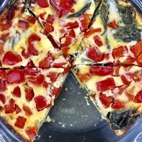Gluten free frittata. Made with cage free organic eggs, spinach, red peppers and vegan mozzarella  at MIGHTY LOVE FOOD in Boston