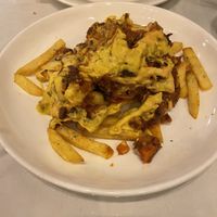 Chilli cheese fries - Already started eating sorry, we were hungry! 😅  at Loving Vegan in Da Nang